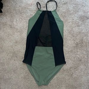 Green and black with mesh panel one piece open back swimsuit never worn